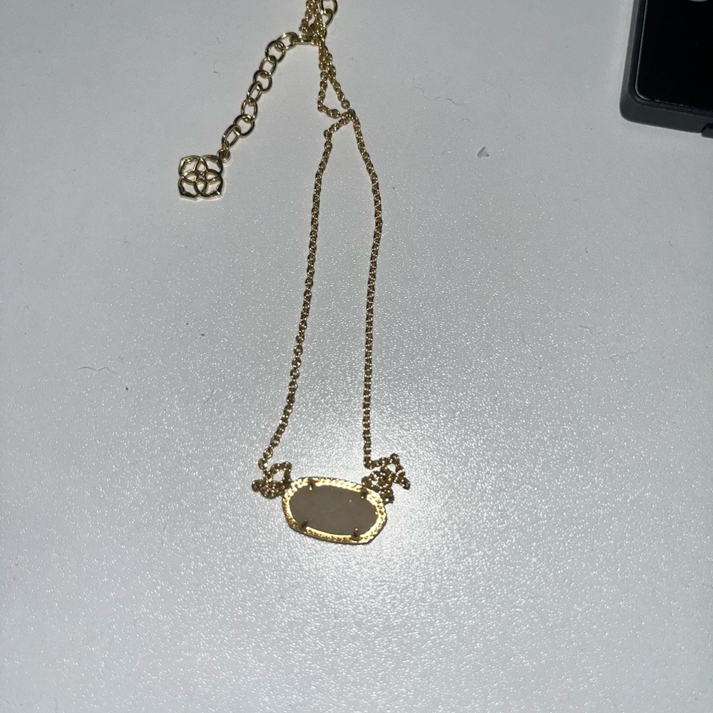 Kendra Scott Gold and Pink Necklace with Elegant Pendant